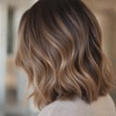 Soft beige highlighted hair outcome for Mara Leal